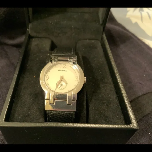 original VERSACE round silver face with black leather strap